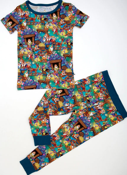 Children's pajama set with miners pattern on a white background